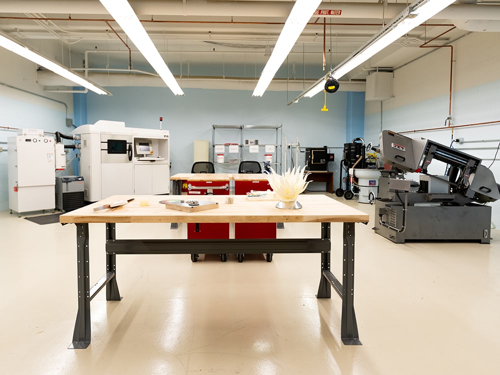 CAMDI Lab space facility with workbench and equipment
